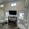 The Modern Tiny Home with Split Loft – Smart Space, Timeless Style (H33SL)